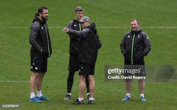 Andy Farrell, the Ireland defence coach, Simon Easterby, forwards coach, Joe Schmidt, head coach and Richie Murphy kicking coach look on during the...