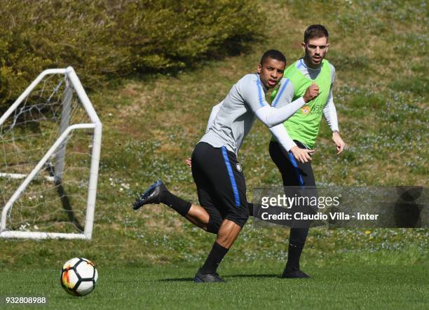 Dalbert Henrique Chagas Estevão and Davide Santon of FC Internazionale compete for the ball during the FC Internazionale training session at the...