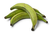 Whole green unripe bananas