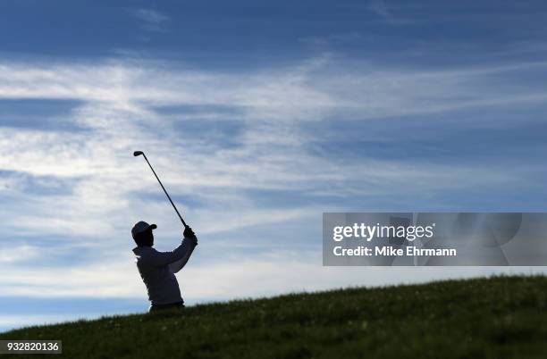 Rory McIlroy of Northern Ireland plays his shot from the 14th tee during the second round at the Arnold Palmer Invitational Presented By MasterCard...