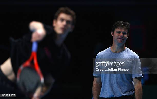 Andy Murray of Great Britain in action in a practice session as coach, Miles Maclagan looks on during the Barclays ATP World Tour Finals - previews...