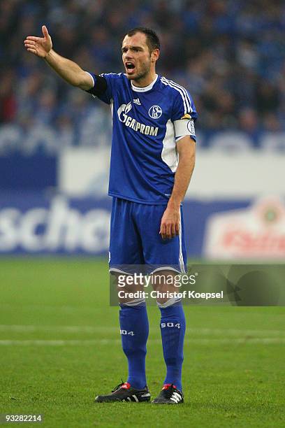 Heiko Westermann of Schalke issues instructions to the team during the Bundesliga match between FC Schalke 04 and Hannover 96 at the Veltins Arena on...