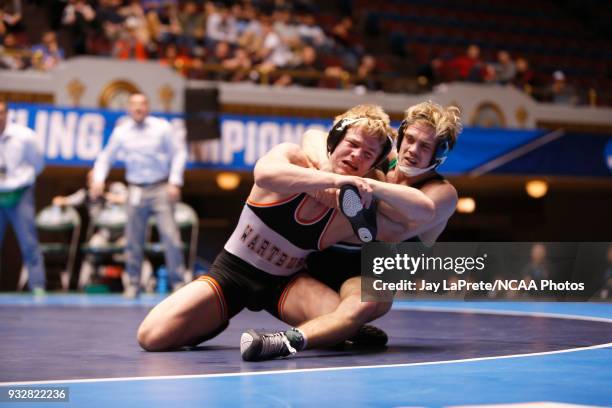 Cross Cannone, of Wartburg, wrestles Gregory Warner, of York, in the 149 weight class during the Division III Men's Wrestling Championship held at...