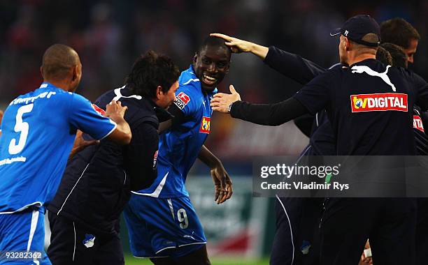 Demba Ba of Hoffenheim is celebrated by his team mates after scoring the 0:3 goal during the Bundesliga match between 1. FC Koeln and 1899 Hoffenheim...