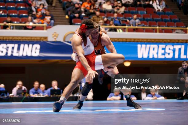 Jake Evans, of Waynesburg, wrestles James Bethel, of SUNY Oneonta, in the 285 weight class during the Division III Men's Wrestling Championship held...