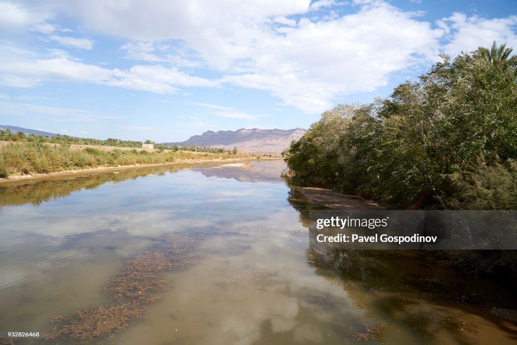The Draa River Moroccos Longest River Flowing Through Fields With Palm ...