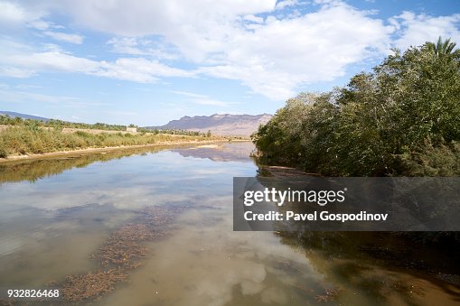 The Draa River Moroccos Longest River Flowing Through Fields With Palm ...