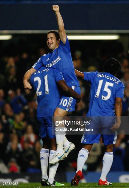 Salomon Kalou of Chelsea lifts Joe Cole in celebration of Cole scoring Chelsea's fourth during the Barclays Premiership match between Chelsea and...