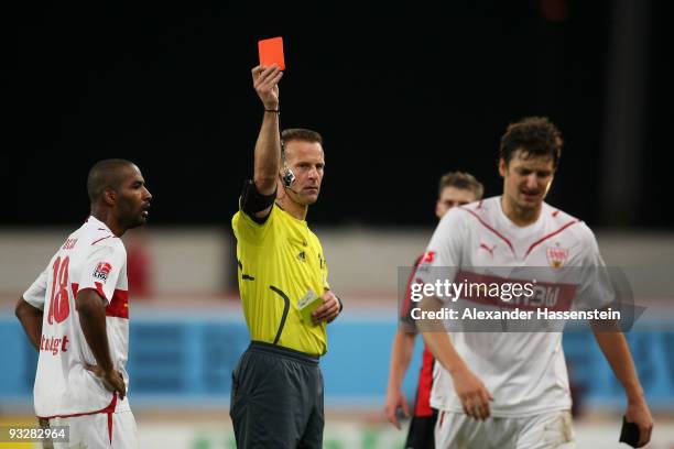 Zdravko Kuzmanovic of Stuttgart walks away after receiving the Red card from referee Peter Gagelmann during the Bundesliga match between VfB...