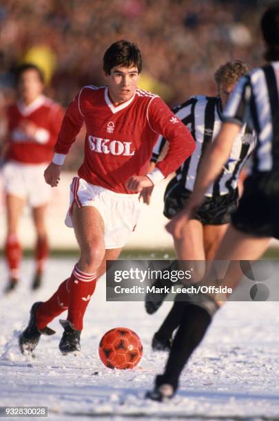 February 1986 Nottingham - Football League Division One - Nottingham Forest v Newcastle United - Nigel Clough of Forest runs across the snow with the...