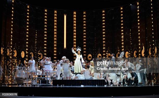 Claudia Boyle as Violetta Valery with artists of the company in English National Opera's production of Giuseppe Verdi's La traviata directed by...