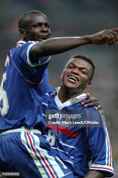 July 1998 FIFA World Cup - France v Croatia - Lilian Thuram is lifted by Marcel Desailly as France celebrate reaching the final