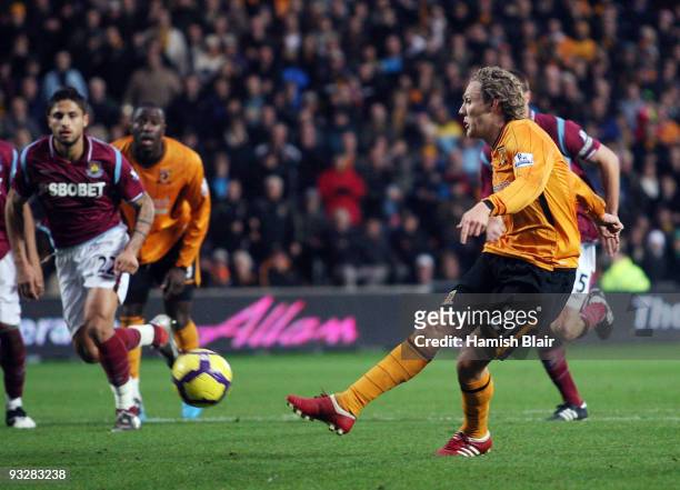 Jimmy Bullard of Hull successfully takes a penalty to score his team's third goal during the Barclays Premier League match between Hull City and West...