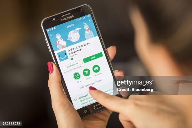 The Grabr Inc. Application is displayed on a Samsung Electronics Co. Galaxy J7 smartphone in an arranged photograph taken in Sao Paulo, Brazil, on...