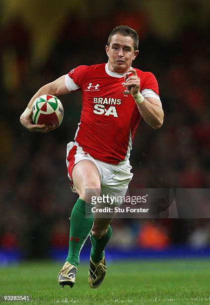 Wales winger Shane Williams races through to score his second try during the International Rugby Union match between Wales and Argentina at...