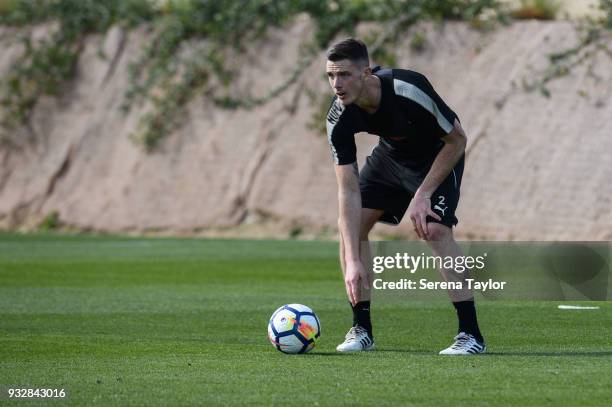 Ciaran Clark looks to take a free kick during the Newcastle United Training Session at Hotel La Finca on March 16 in Alicante, Spain.