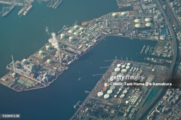 tokyo bay and factory area in yokohama city in kanagawa prefecture in japan daytime aerial view from airplane - kanagawa prefecture stock pictures, royalty-free photos & images