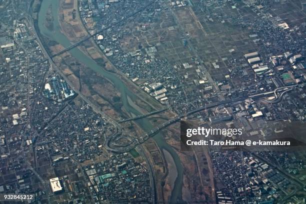 sagami river, ebina and atsugi cities in kanagawa prefecture in japan daytime aerial view from airplane - ebina city stock pictures, royalty-free photos & images