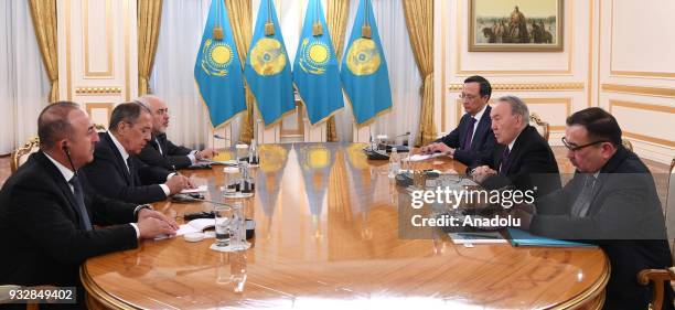 President of Kazakhstan Nursultan Nazarbayev receives Minister of Foreign Affairs of Turkey, Mevlut Cavusoglu , Russian Foreign Minister, Sergei...