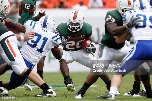 Damien Berry of the Miami Hurricanes runs with the ball against the Duke Blue Devils on November 21, 2009 at Land Shark Stadium in Miami Gardens,...