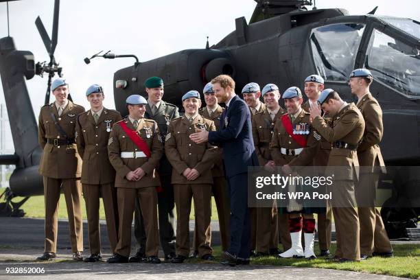 Prince Harry attends a ceremony at the Museum of Army Flying as he presents 12 pilots from Course 17/02 of the Army Air Corps with their Wings on...