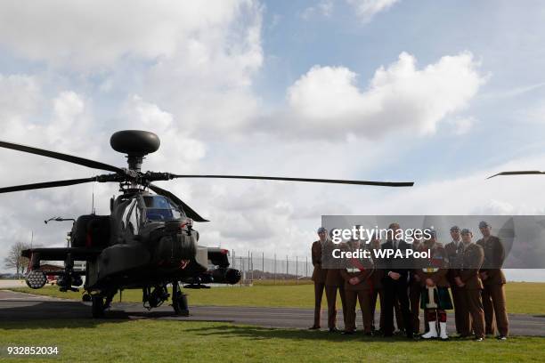 Prince Harry attends a ceremony at the Museum of Army Flying as he presents 12 pilots from Course 17/02 of the Army Air Corps with their Wings on...