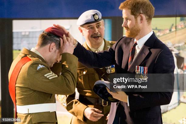 Prince Harry attends a ceremony at the Museum of Army Flying as he presents 12 pilots from Course 17/02 of the Army Air Corps with their Wings on...