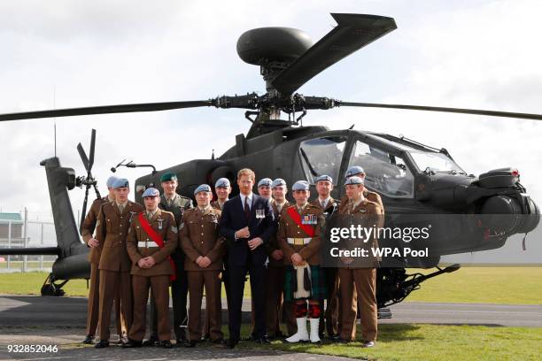 Prince Harry attends a ceremony at the Museum of Army Flying as he presents 12 pilots from Course 17/02 of the Army Air Corps with their Wings on...