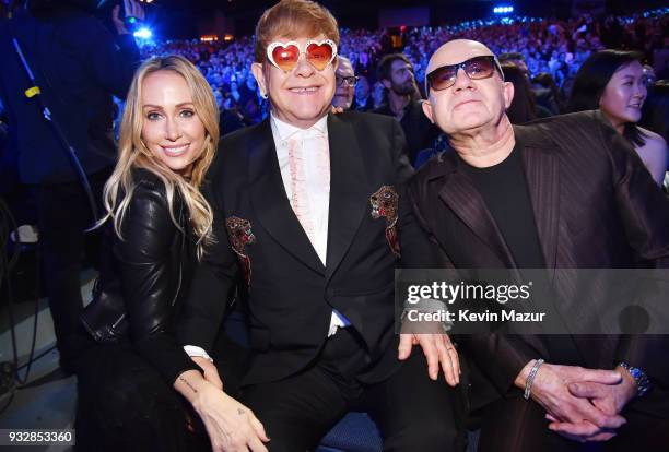 Tish Cyrus, Elton John, and Bernie Taupin attend the 60th Annual GRAMMY Awards - I'm Still Standing: A GRAMMY Salute To Elton John at the Theater at...