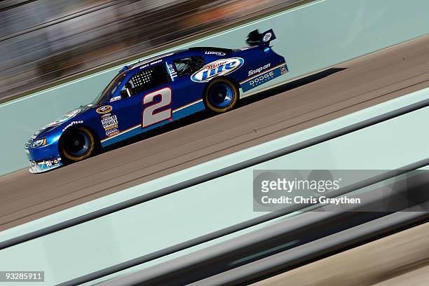 Kurt Busch drives the Miller Lite Dodge during practice for the NASCAR Sprint Cup Series Ford 400 at Homestead-Miami Speedway on November 21, 2009 in...