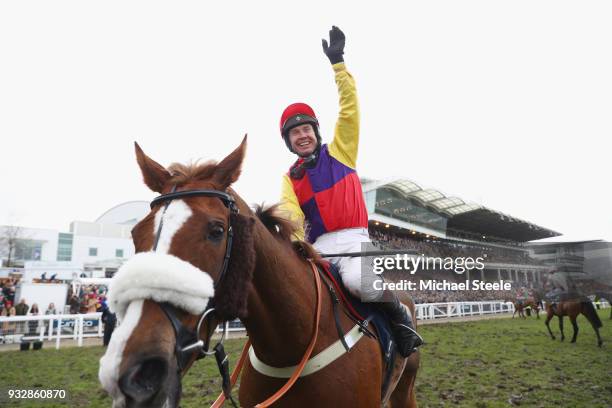 Richard Johnson on Native River celebrates after winning the Timico Cheltenham Gold Cup Chase at the Cheltenham Festival at Cheltenham Racecourse on...