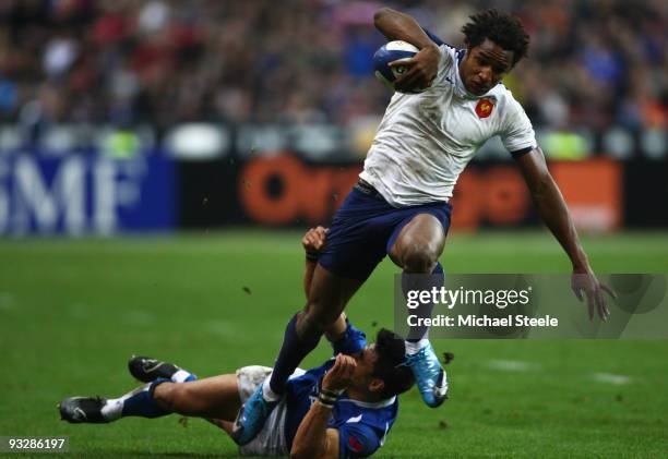 Benjamin Fall of France powers his way past David Lemi of Samoa during the France v Samoa International match at the Stade de France on November 21,...