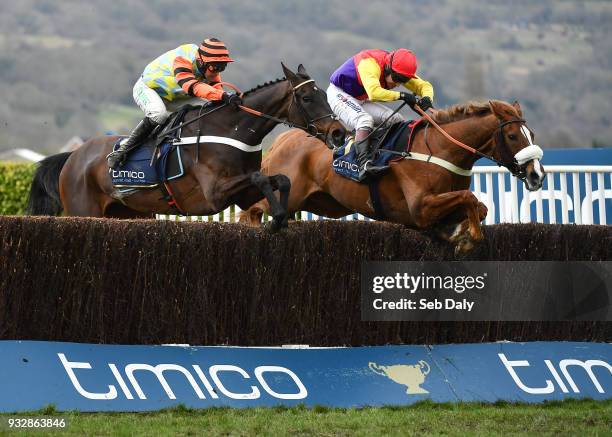 Cheltenham , United Kingdom - 16 March 2018; Native River, with Richard Johnson up, right, jump the last fence ahead of eventual second place...