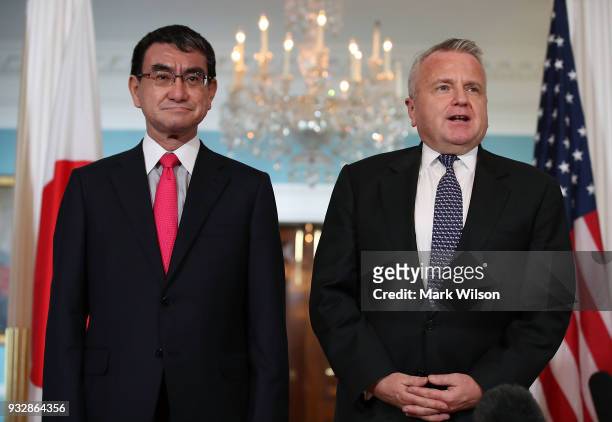 Deputy Secretary of State John Sullivan , greets Japanese Foreign Minister Taro Kono before a meeting at the State Department on March 16, 2018 in...
