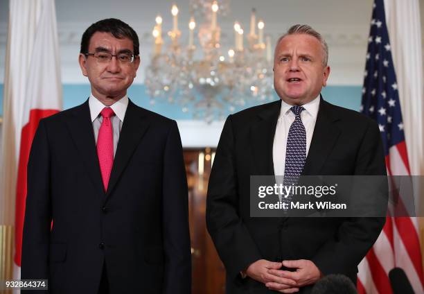 Deputy Secretary of State John Sullivan , greets Japanese Foreign Minister Taro Kono before a meeting at the State Department on March 16, 2018 in...