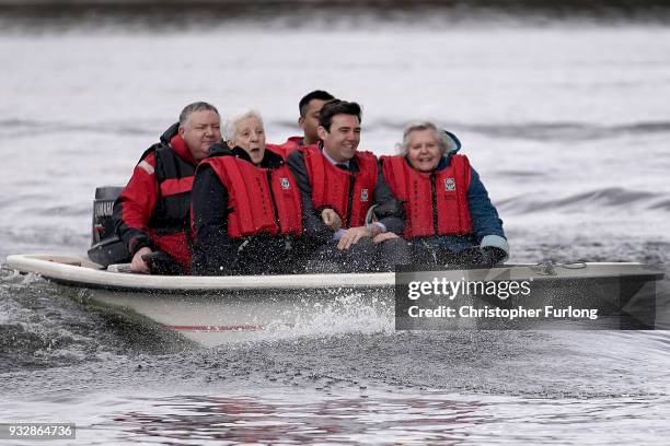 Mayor of Greater Manchester Andy Burnham takes part in a powerboat ride with pensioners on March 16, 2018 in Manchester, England. The World Health...