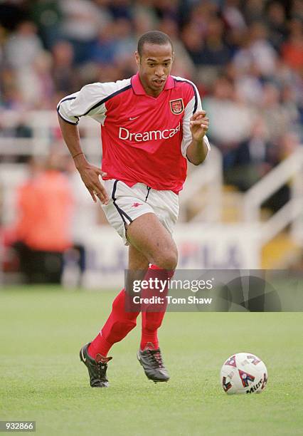 Thierry Henry of Arsenal runs with the ball during the pre-season match against Rushden & Diamonds played at Nene Park, in Irthlinborough, England....