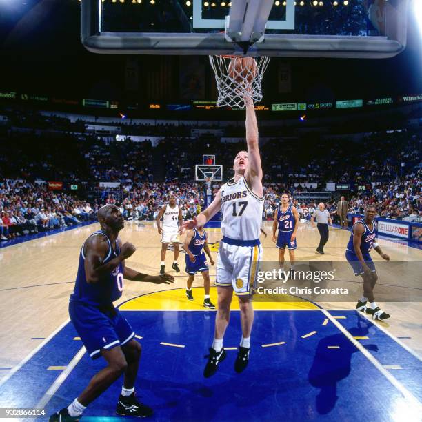 Chris Mullin of the Golden State Warriors shoots on April 21, 1994 at the Oakland-Alameda Coliseum in Oaklan, California. NOTE TO USER: User...