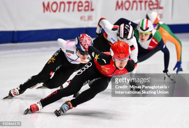 Tianyu Han of China leads the pack in the men's 1500 meter heats during the World Short Track Speed Skating Championships at Maurice Richard Arena on...