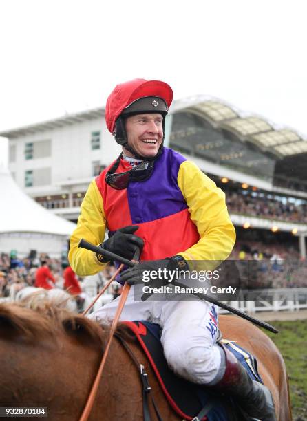 Cheltenham , United Kingdom - 16 March 2018; Jockey Richard Johnson celebrates after winning the Timico Cheltenham Gold Cup Steeple Chase on Native...