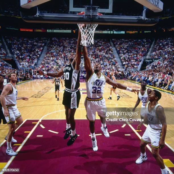 Karl Malone of the Utah Jazz shoots during Game Three of the First Round of the 1994 NBA Playoffs on May 3, 1994 at the Delta Center in Salt Lake...