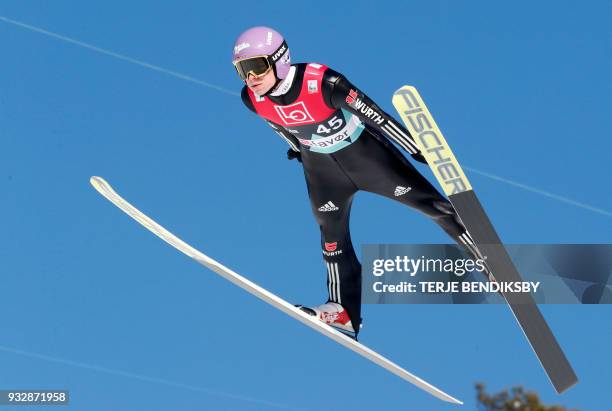 Andreas Wellinger from Germany soars through the air during the men's ski jumping event of the FIS World Cup qualification round in Vikersund,...