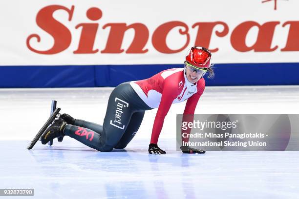 Marianne St-Gelais of Canada falls as she competes in the women's 1500 meter heats during the World Short Track Speed Skating Championships at...