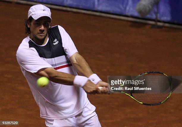 Eduardo Schwank of Argentina returns a shot against Brian Dabul of Argentina during the Lima Challenger Movistar Open on November 21, 2009 in Lima,...