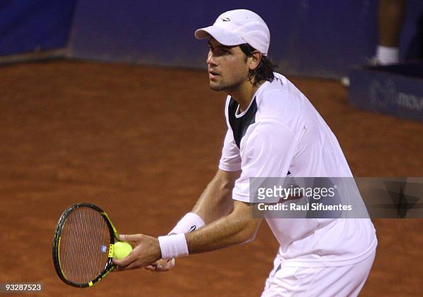 Eduardo Schwank of Argentina serves to Brian Dabul of Argentina during the Lima Challenger Movistar Open on November 21, 2009 in Lima, Peru.