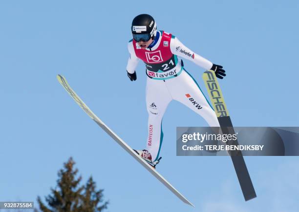 Andreas Schuler from Switzerland soars through the air during the men's ski jumping event of the FIS World Cup qualification round in Vikersund,...