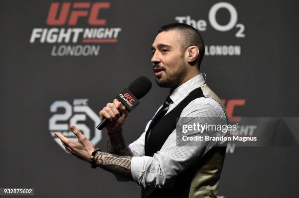 Commentator Dan Hardy interacts with fans during a Q&A session before the UFC Fight Night weigh-in inside The O2 Arena on March 16, 2018 in London,...