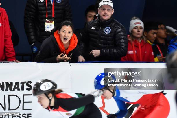 Team Hungary's coach Jing Zhang yells out instructions in the women's 1500 meter heats during the World Short Track Speed Skating Championships at...