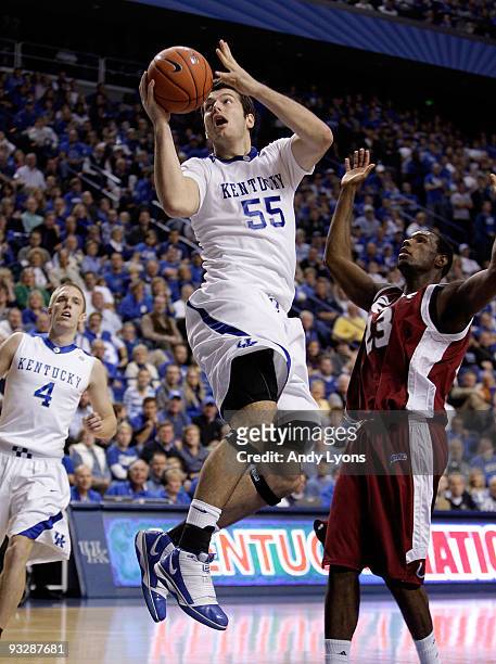 Josh Harrellson of the Kentucky Wildcats shoots the ball during the game against the Rider Broncs on November 21, 2009 at Rupp Arena in Lexington,...