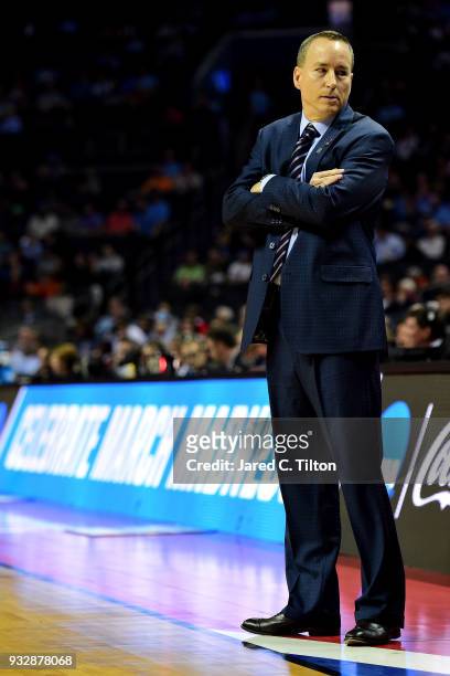 Head coach Billy Kennedy of the Texas A&M Aggies looks to his bench against the Providence Friars during the first round of the 2018 NCAA Men's...